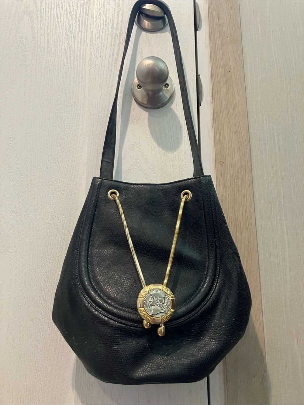 Rodo vintage Black Leather bucket Bag with Gold Medallion Accent